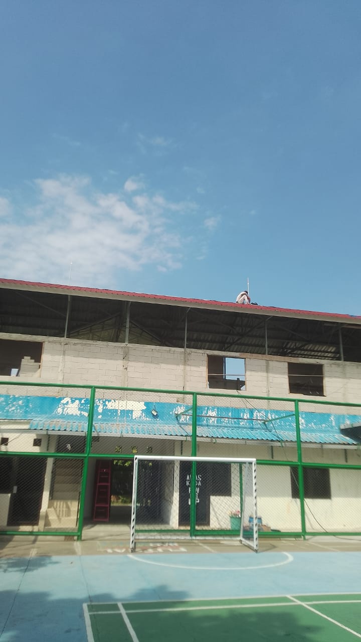 Pemasangan Penangkal Petir Gedung Balai RW Perum IKIP Gunung Anyar Surabaya